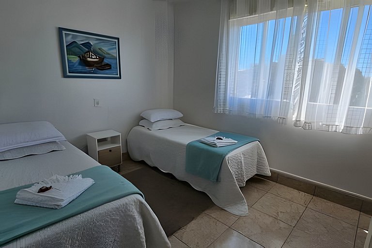 Casa com Lareira e Ar Condicionado Bem Localizada