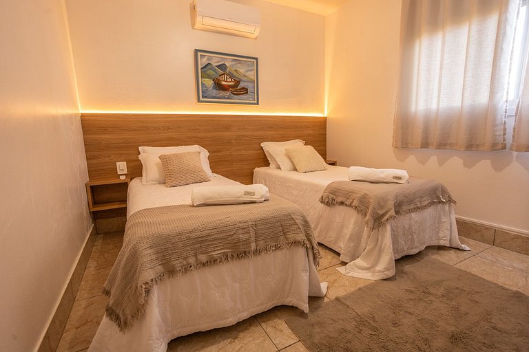 Casa com Lareira e Ar Condicionado Bem Localizada